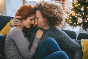 couple forgiving each other after having an argument in a healthy and positive manner thanks to the boyfriend going to individual counseling in Simi Valley, ca